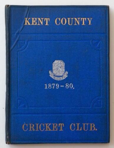 Kent County Cricket Club Annual 1879-1880. Hardback 'blue book'. Original decorative boards. Gilt titles and to all page edges with silver gilt Kent emblem to centre. Printed by C.E. Davey, 'Kent Herald' Office 1880. Minor age toning/darkening to board ed