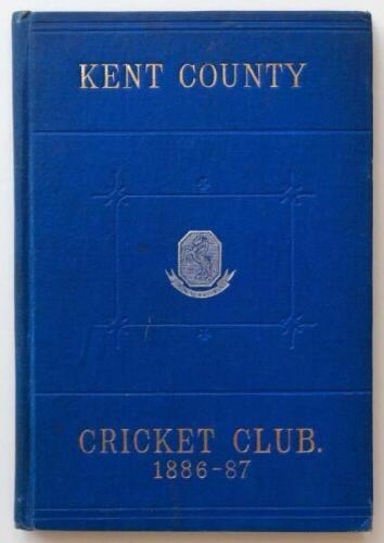 Kent County Cricket Club Annual 1886-1887. Hardback 'blue book'. Original decorative boards. Gilt titles and to all page edges with silver gilt Kent emblem to centre. Printed by J. Burgiss-Brown, Maidstone 1887. Minor age toning/darkening to board edges a