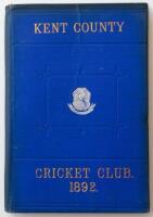 Kent County Cricket Club Annual 1892. Hardback 'blue book'. Original decorative boards. Gilt titles and to all page edges with silver gilt Kent emblem to centre. Printed by J. Burgiss-Brown, Maidstone 1892. Minor age toning/darkening to board edges and sp