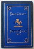Kent County Cricket Club Annual 1897. Hardback 'blue book'. Original decorative boards. Gilt titles and to all page edges with gilt Kent emblem to centre. Printed by Cross & Jackman, 'The Canterbury Press' 1897. Minor age toning/darkening to board edges a