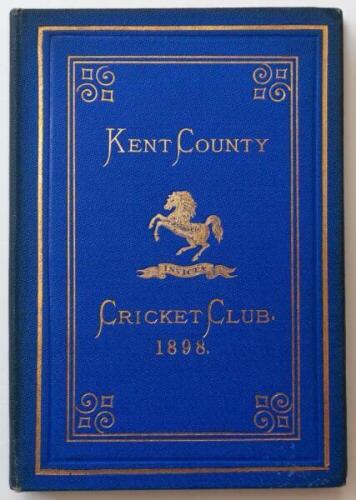 Kent County Cricket Club Annual 1898. Hardback 'blue book'. Original decorative boards. Gilt titles and to all page edges with gilt Kent emblem to centre. Printed by Cross & Jackman, 'The Canterbury Press' 1898. Minor age toning/darkening to board edges a