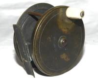 Fishing. Brass fly reel by C. Farlow & Co. of The Strand, London, late 1800s. Original bone winding handle. Maker's mark of a fish to foot and engraved name and London address to side. Approx. 4" diameter. G/VG