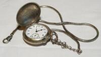 'Brev' number 107244 Swiss made pocket watch set in a case in the form of a flattened Dunlop 'square mesh' golf ball with hinged lid c.1924. 'Dunlop 5' to lid and base. Maker's mark and registration number to inside of lid. The watch appears to be in work