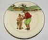 Royal Doulton 'Golfing series' plate, decorated in colour with cavalier figure (Crombie) of a golfer and caddie with inscription 'All Fools are not knaves. But all knaves are fools'. Colour golf course illustration to top. 10.5" diameter. With Royal Doult