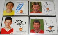 Manchester United F.C. Selection of sixteen official United colour 'half' club cards. Each signed by the player featured. Signatures are Kuszczak, R. Keane, D. Jones, Irwin, M. Wilson, Larsson, Yorke, Lynch, Heaton, Stam, M. Stewart, Tierney, Heinze, D. J