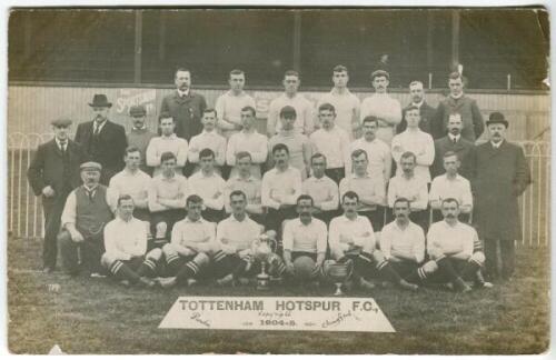 Tottenham Hotspur F.C. 1904/05. Rare early mono real photograph postcard of the team playing staff and officials, standing and seated in rows, with title 'Tottenham Hotspur F.C. 1904-05' to lower border. Postcard by Purdie of Chingford. No. 7291 to left h