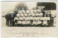 Tottenham Hotspur F.C. 1906/07. Rare early mono real photograph postcard of the team playing staff and officials, standing and seated in rows, with title 'Tottenham Hotspur Football Club 1906-07' and players names printed to lower border. Postcard by Jone