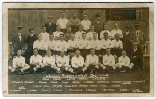 Tottenham Hotspur F.C. 1911/12. Early sepia real photograph postcard of the team and officials, standing and seated in rows, with title and players names printed to lower border. F.W.Jones of Tottenham. Postally unused. Rare. Some soiling to white outer b