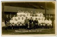 Tottenham Hotspur F.C. 1919/20. Mono real photograph postcard of the team and officials, standing and seated in rows, with title printed to lower border 'Tottenham Hotspur F.C. Season 1919-20'. Appears to be by Crawford, Edmonton. Postally unused. Light c