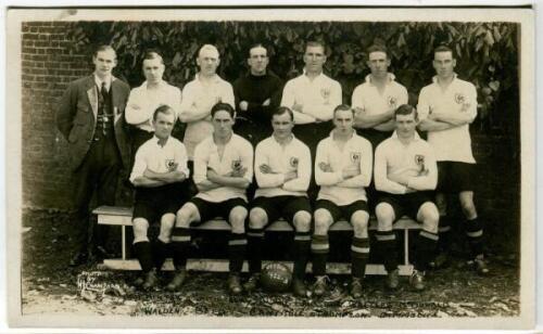 Tottenham Hotspur F.C. 1922/23. Mono real photograph postcard of the team and trainer, standing and seated in rows. Players names printed in black to lower border. W.J. Crawford of Edmonton. Postally unused. Minor soiling to face of image otherwise in goo