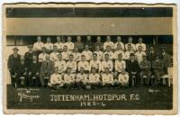 Tottenham Hotspur F.C. 1923/24. Mono real photograph postcard of the team, officials and Directors, standing and seated in rows, with title 'Tottenham Hotspur F.C. 1923/1924' printed to lower border. W.J. Crawford of Edmonton. Postally unused. Some nicks 