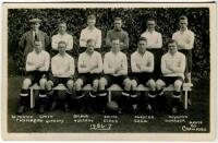 Tottenham Hotspur F.C. 1926/27. Mono real photograph postcard of the team and trainer, standing and seated in rows, with title and players names printed to lower border. W.J. Crawford of Edmonton. Postally unused. Some silvering to image edges otherwise i