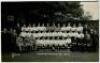 Tottenham Hotspur F.C. 1931/32. Mono real photograph postcard of the playing staff, officials and directors, standing and seated in rows, with title to lower border. W.J. Crawford of Edmonton. Postally unused. Very good condition - football