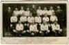 Tottenham Hotspur F.C. 1933/34. Mono real photograph postcard of the team, manager and trainer, standing and seated in rows, with title and players names to lower border. W.J. Crawford of Edmonton. Postally unused. Tear to the centre of the top border of 