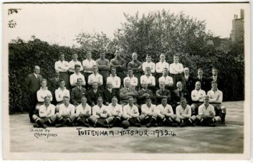 Tottenham Hotspur F.C. 1933/34. Mono real photograph postcard of the playing staff, officials and directors, standing and seated in rows, with title to lower border. W.J. Crawford of Edmonton. Postally unused. Very good condition - football