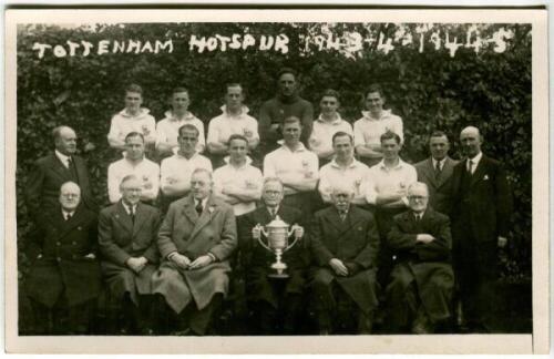 Tottenham Hotspur F.C. 1943/44, 1944/45. Mono real photograph plainback postcard of the team and official with a trophy displayed to centre, standing and seated in rows, with title to upper border 'Tottenham Hotspur 1943/44, 1944/45'. Publisher unknown. G