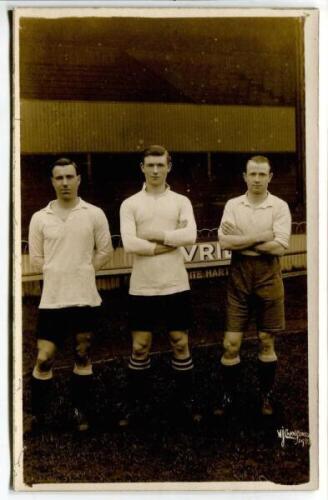 James Dimmock [?]. Tottenham Hotspur 1919-1930 James Cantrell. Tottenham Hotspur 1912-1922 and Herbert Bliss. Tottenham Hotspur 1912-1922. Sepia real photograph postcard of the three players, full length, in Spurs attire. W.J. Crawford of Edmonton. Good/v