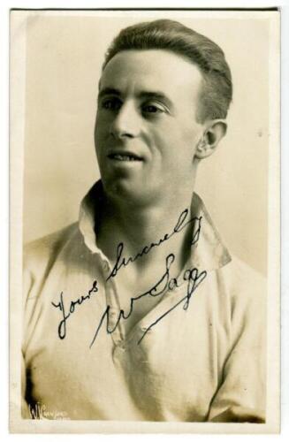 William Sage. Tottenham Hotspur 1919-1925. Excellent sepia real photograph postcard of Sage, half length, in Spurs shirt. Very nicely signed in ink 'Yours Sincerely'. 'W.J. Crawford of Edmonton'. Very good condition Postally unused. Rare - football