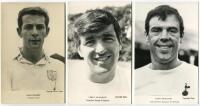 Tottenham Hotspur 1960's. Eight mono real photograph postcards of Alan Gilzean (2, different), Alan Mullery, Terry Venables, Mike England, John White, James Robertson and Dave Mackay. Six of the eight are plain back postcards. Head and shoulders and full 