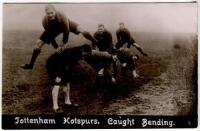 'Tottenham Hotspurs. Caught Bending. 1' 1909. Early mono real photograph postcard of some of the players in training with title printed to lower border. Shamrock & Co, London. Postally used and dated April 1913. Rare. Good/very good condition - football