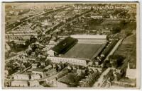 Tottenham Hotspur F.C. 'Spurs Ground from the air' c1925. Sepia real photograph postcard of White Hart Lane from the air. Publisher unknown. Postally unused. Good condition. A rare postcard - football