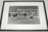 Tottenham Hotspur F.C. 1960s. Mono photograph of Martin Peters scoring for England against West Germany in the 1966 World Cup Final. Boldly signed in ink by Peters. Mounted, framed and glazed, overall 17"x13". Sold with a colour photograph of Alan Mullery