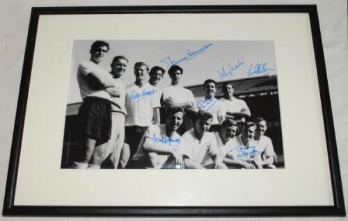 Tottenham Hotspur F.C. 1960s. Mono photograph of the pre-match Tottenham team, signed in later years in blue ink by seven players. Signatures are Maurice Norman, Peter Baker, Dave Mackay, Cliff Jones, Terry Dyson, Tony Marchi and Les Allen. Mounted, frame