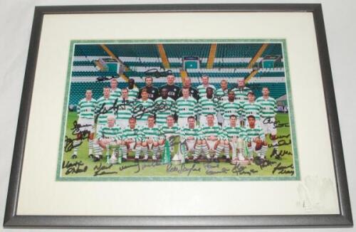 Celtic F.C. circa 2000. Colour photograph of the Celtic playing staff, sitting and seated in crowds, at the ground. Signed by over twenty players in thicker pen. Signatures include Lennon , Boyd, Diuglas, Petrov, Guppy, Thompson, Balde, O'Neill, Larsson, 