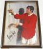 George Best. Manchester United. Colour copy photograph of Best, dressed in full United kit in the shower, signed to the image by Best. 8"x10". G/VG - football