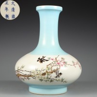 A Famille Rose Floral and Bird Bottle Vase Qing DynastyÃŠ