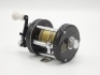 A very rare Abu Ambassadeur 6000 black finish bait casting reel, grooved rims, counter-balanced single crank handle above a black five point star drag wheel, rim spool release button and rear graduated spindle tension adjuster, no foot number and in orig - 2