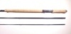 A Hardy "Elite" 3 piece carbon salmon fly rod, 15' 4", #10, blue silk wraps, anodised screw grip reel fitting, little used condition in bag and canvas covered tube