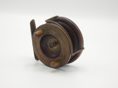 A scarce Hardy Nottingham 3" centre pin reel, walnut drum with twin horn handles mounted on brass elliptical plates, central well recess and brass telephone release latch, Bickerdyke line guide, starback stancheon foot with sliding optional check button a