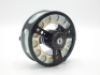 A Sage 3500D salmon fly reel and spare spool, right hand wind model, large arbour drum with counter-balanced handle, black anodised cage, rear graduated spindle tension adjuster, wear from normal use, in original neoprene pouches - 2