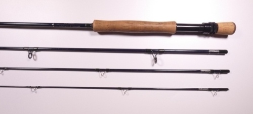 A Thomas & Thomas "H II 907S-4" 4 piece carbon salmon trout fly rod, 9', #7, blue silk wraps, black anodised screw grip reel fitting, light use only, in bag and alloy tube