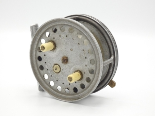 A rare Hardy Eureka 4" alloy bait casting reel, shallow cored drum with twin ivorine handles, jewelled spindle bearing and spring release latch, alloy foot, rim mounted casting trigger, rear mounted nickel silver casting regulator button and sliding press