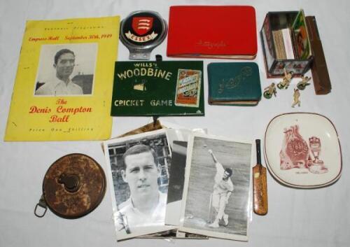 Cricket ephemera. A small box comprising a mixed selection of mainly cricket ephemera including metalware, books, brochures, equipment, autographs, photographs etc. Contents include two autograph albums (one very small) with the odd sporting and cricket s