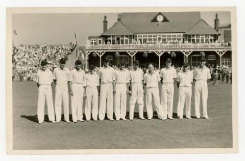 South African tour to England 1955. Mono real photograph plain back postcard of the South African team for the match v T.N. Pearce's XI, Scarborough 7th- 9th September 1955. The players lined up in one row wearing cricket attire, the pavilion in the backg