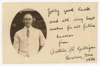Inaugural M.C.C. tour to India 1926/27. Mono real photograph postcard from the tour of the M.C.C. of the captain, A.E.R. Gilligan in cameo, head and shoulders wearing jacket and tie. Hand written signed dedication in black ink from Gilligan to the front, 