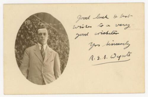 Inaugural M.C.C. tour to India 1926/27. Mono real photograph postcard from the tour of the M.C.C. of R.E.S. Wyatt in cameo, head and shoulders suit and tie. Hand written signed dedication in black ink from Wyatt to the front, 'Good luck &amp; best wishes 