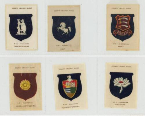Cricket cigarette cards 1921 onwards. A good selection of loose cards. Complete sets are Godfrey Phillips 'County Cricket Badge' silks 1938 (full set of 17). W.D. &amp; H.O. Wills 'English Cricketers' New Zealand issue 1926 (25), and 'Cricketers' 1928 sec