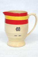 M.C.C. 1787-1937. '150th Anniversary of the Marylebone Cricket Club'. Large attractive cream ware jug produced by Minton to commemorate the event in 1937. M.C.C. colours of red and yellow in bands to top of the jug with 'M.C.C. 1787-1937' inscribed below 