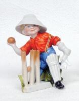 'How's That?'. Kinsella caricature spill vase of a young boy, in wicket keeper pose, holding ball with broken wickets appealing for a stumping. Lacking printed title below wickets. 'Copyright 489712' stamp impressed to base. German, circa early 1900's. 5.