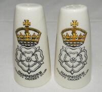Hampshire County Cricket Club. Pair of salt and pepper pots with transfer printed colour image of the Hampshire emblem and name beneath to each pot and name printed beneath. Lancaster &amp; Sandland Ltd. 4&quot; tall. Lacking stoppers to bases. G - cricke