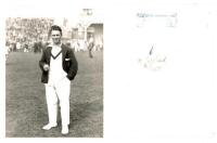 Maurice Leyland. Yorkshire &amp; England 1920-1947. Original mono photograph of Leyland at Scarborough standing full length on the outfield wearing cricket attire and England blazer, cigarette in hand, with a large crowd in the background. The photograph 