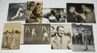 Don Bradman. Australian tour to England 1948. Fifteen original mono press photographs all featuring Bradman during the 1948 tour. Photographs depict Bradman in batting action in Australia prior to departing for the tour, departing Freemantle on board the 