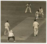 Stan McCabe. Australia v England 1936/37. Original sepia press photograph of McCabe playing a shot to square leg off the bowling of Jim Sims during the first day's play of the third Test at Melbourne, 1st- 7th January 1937. The photograph nicely signed in