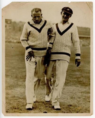Don Bradman 1934. Large original mono press photograph of Bradman being helped off the field by Stan McCabe at Headingley having sustained a leg injury. The photograph, dated 23rd July 1934, by Sport &amp; General measures 10&quot;x8&quot;. Loss and nicks
