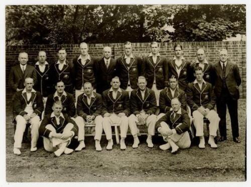 Australia tour to England 1934. Official mono press photograph of the full Australian touring party seated and standing in rows wearing tour blazers. Players featured include Woodfull (Captain), Bradman, Chipperfield, Ebeling, Kippax, McCabe, Oldfield, Fl