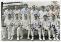 England v West Indies 1966. Mono postcard size copy photograph of the England twelve for the first Test, Old Trafford, 2nd-4th June 1966. Players are depicted seated and standing in rows wearing cricket attire. Signed to the photograph in different colour